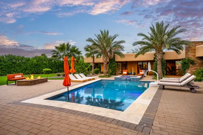 Outdoor pool and resort area at Plugged In Recovery